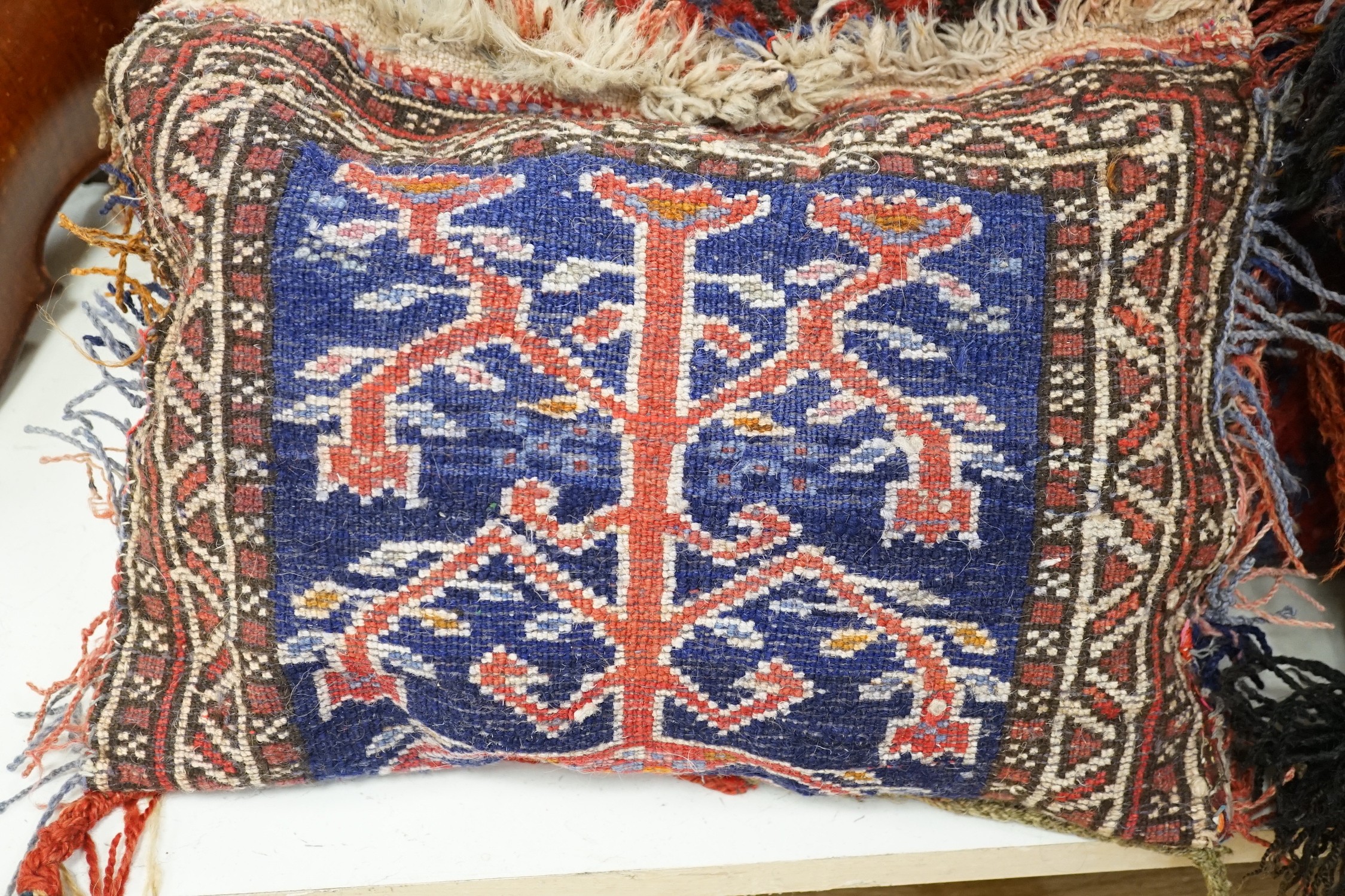 Five handmade Pakistani wool carpet cushions